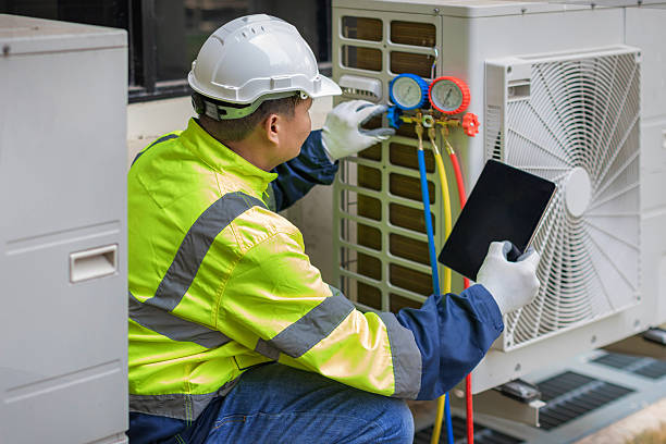 Professional Hvac technician working in Whitman, MA